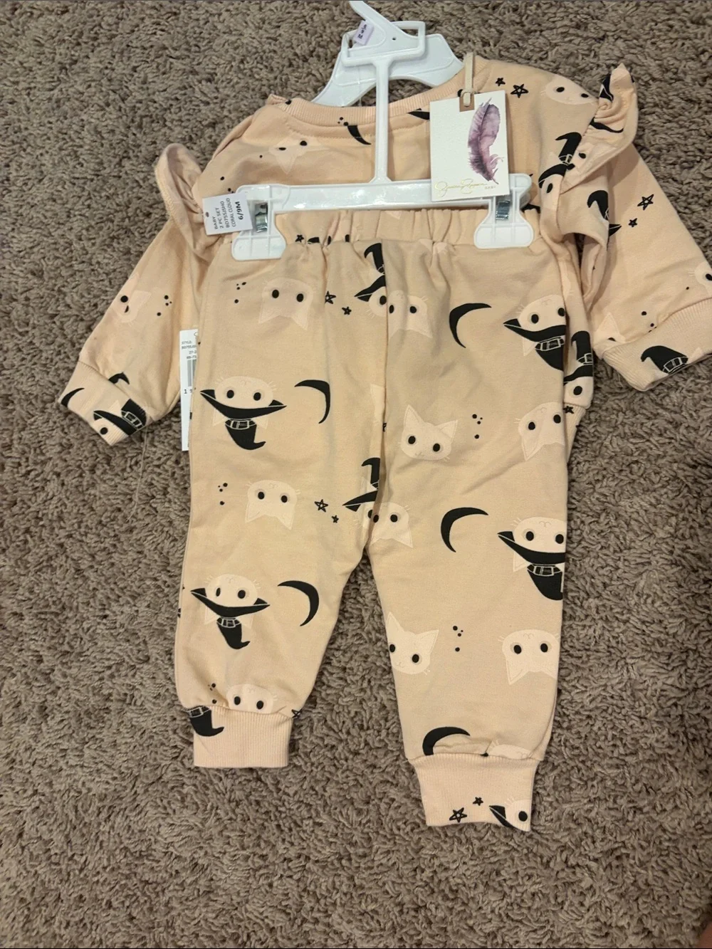 Jessica Simpson has pale pink Halloween Kids Pajama Set with Cat & Moon Print